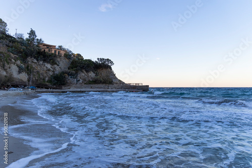 Coast and sea near Sant'Andrea on the island of Elba in Italy with blue sky in summer at dusk © were