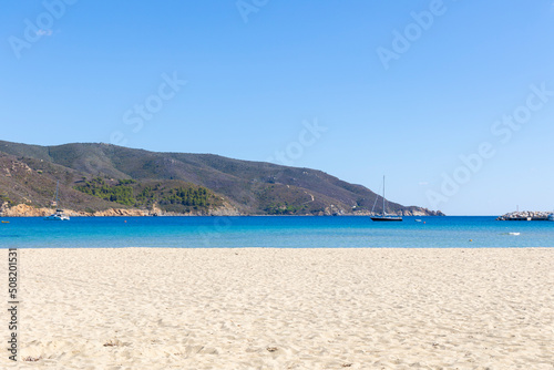 beach in in Marina di Campo on the island of Elba in Italy in summer with blue sky