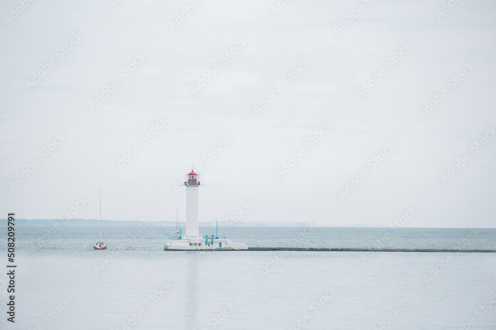Lighthouse in the sea. Beautiful lighthouse in the black sea. background