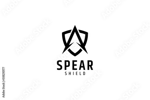 Arrow or spear head and shield logo. Icons of warriors, primitive tribes, strength, protection and defense. Simple flat concept in black on white background.