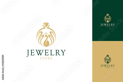 Diamond ring jewelry logo and peacock shape. Symbol of jewelry manufacturing, gold and gem shop. Luxurious and elegant flat concept with several premium color displays