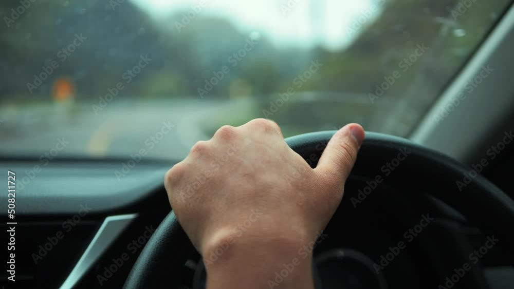 custom made wallpaper toronto digitalCar driver man hands holding steering wheel high quality 4K footage. Thailand.