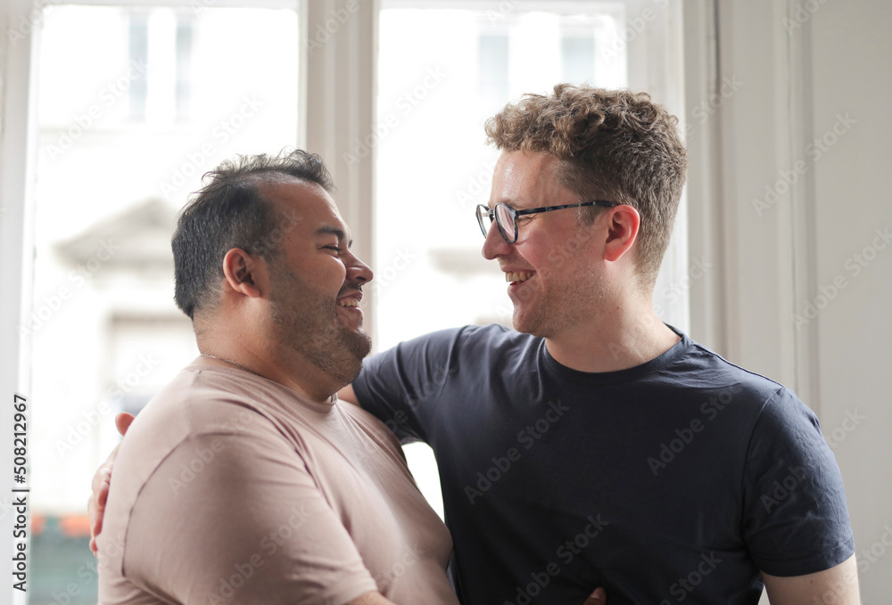couple of friends discusses cheerful at home couple of friends discusses cheerful at home