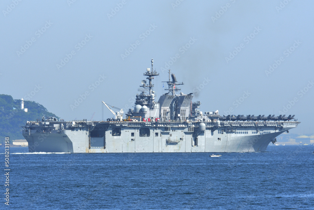 United States Navy amphibious assault ship USS Tripoli sailing in Tokyo