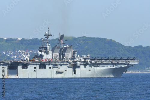 Wallpaper Mural United States Navy amphibious assault ship USS Tripoli sailing in Tokyo Bay