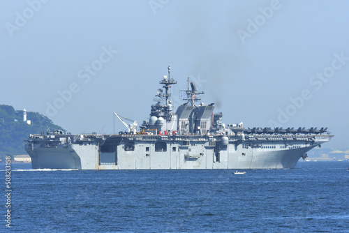 United States Navy amphibious assault ship USS Tripoli sailing in Tokyo Bay.