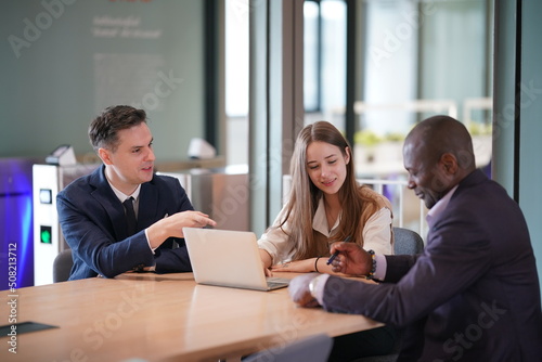 Team of professionals discussing over new business project
