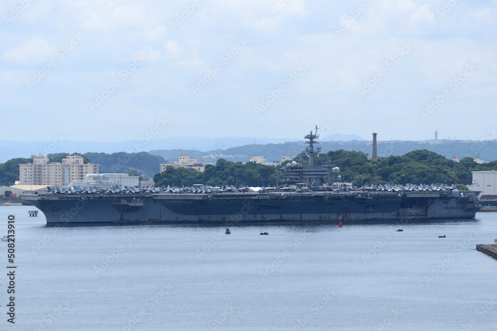 United States Navy USS Abraham Lincoln (CVN-72), Nimitz-class aircraft carrier departing from Yokosuka Port.