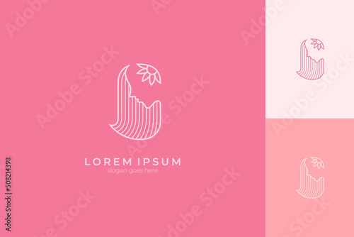 Logo of a beautiful woman's face with loose hair and floral decoration on her head in a line art style, feminine, mature, luxurious and modern design
