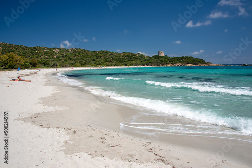 crystal clear waters and white sand at Cala Pira beach  Sardinia