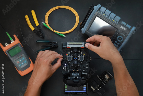Konstfotografi Fiber Optic Fusion Splicing Cable Internet equipment and Wire connection with Fi