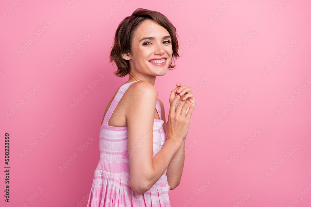 Profile side photo of young lovely charming girl hands together sensual isolated over pink color background Profile side photo of young lovely charming girl hands together sensual isolated over pink color background