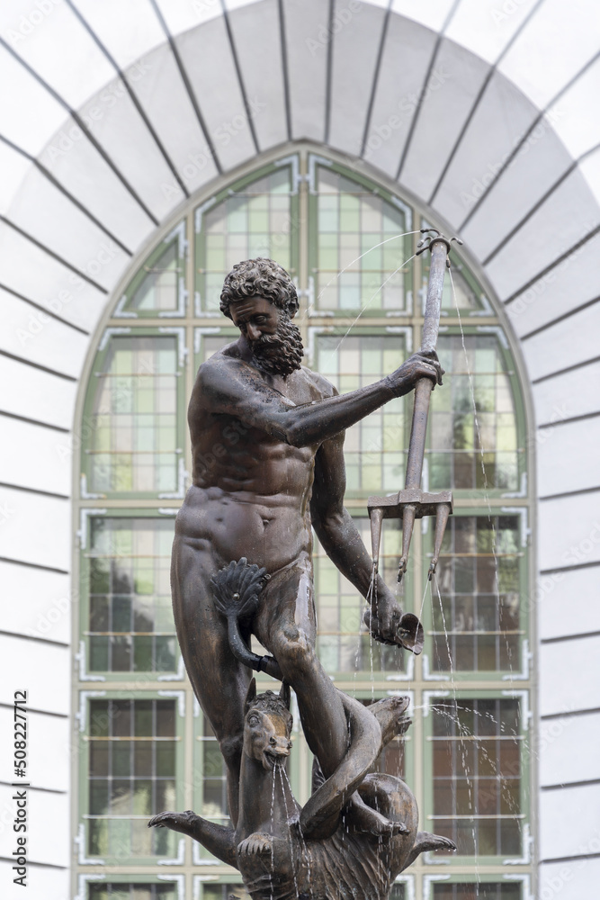 Neptune fountain in Gdansk, Pomerania, Poland. Sculpture in Old Town. Gdansk historical city landmark. Neptune fountain in Gdansk, Pomerania, Poland. Sculpture in Old Town. Gdansk historical city landmark.