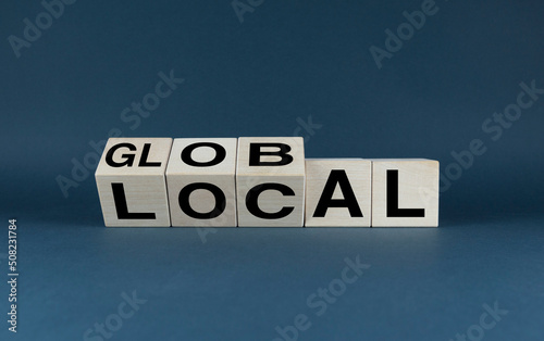 Global or Local. The cubes form the choice words Global or Local.