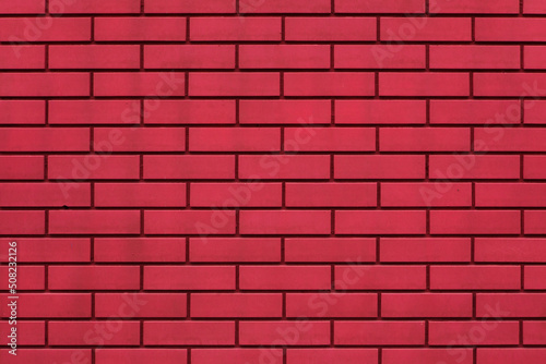 Purple red brick wall. Background texture.