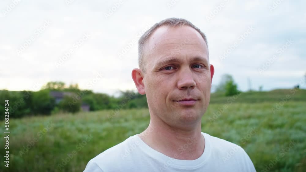 portrait shot of an adult male in a mountainous area. portrait shot of an adult male in a mountainous area.