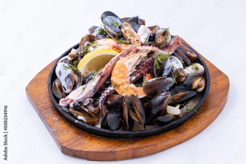 Mixed seafood platter. Assorted sea food on plate Mixed seafood platter. Assorted sea food on plate