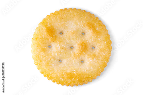 Top view of single round buttery cracker with 7 holes and salt Isolated on white background Macro With Shadow Flat Lay Perfect Snack photo