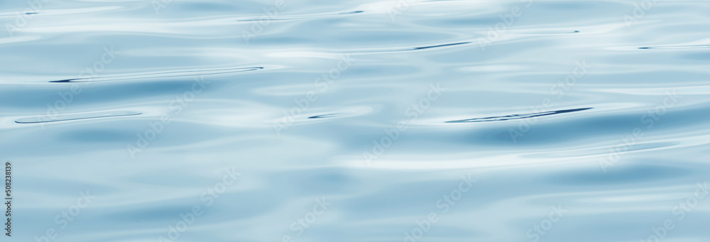 smooth and soft water waves, abstract wavy liquid background concept with copy space in light blue color smooth and soft water waves, abstract wavy liquid background concept with copy space in light blue color