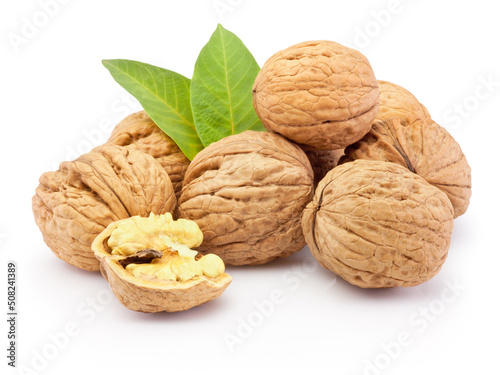 Walnuts with leaves isolated on a white background