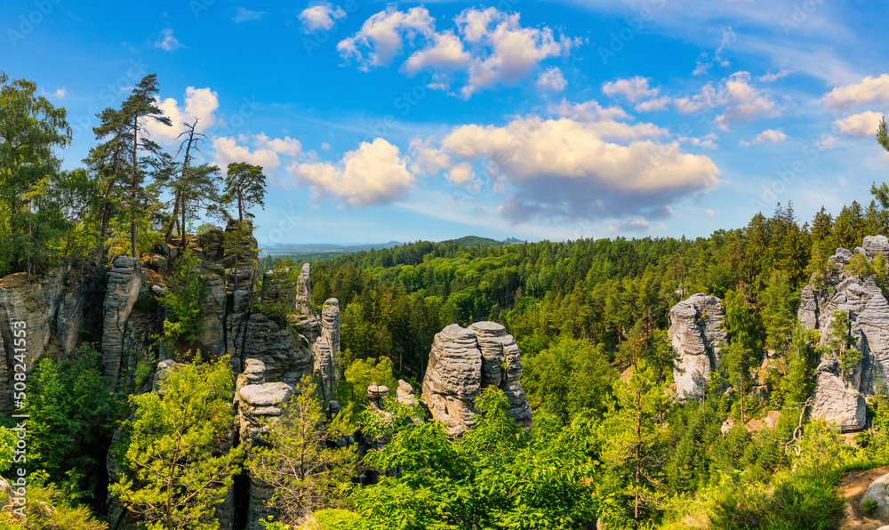 Prachov rocks (Prachovske skaly) in Cesky Raj region, Czech Republic. Sandstone rock formation in vibrant forest. Prachov Rocks, Czech: Prachovske skaly, in Bohemian Paradise, Czech Republic.