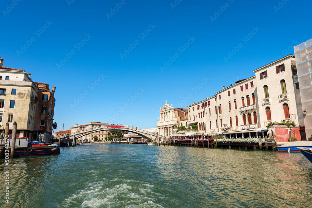 Grand Canal (Canal Grande) in Venice downtown, church of Santa Maria di Nazareth or degli Scalzi, bridge called Ponte degli Scalzi and the railway station. Venetian lagoon, Veneto, Italy, Europe.