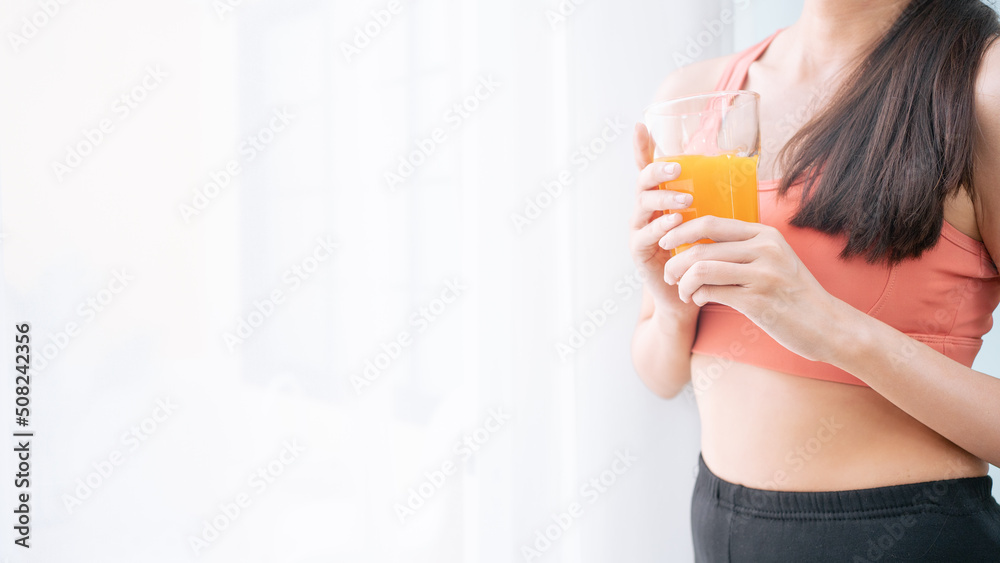 Smiling young Asian white woman in sportswear drinking juice in the kitchen at home.Health care fit and firm slim Beautiful female Happy healthy person.Thai female
good health standing confident. Smiling young Asian white woman in sportswear drinking juice in the kitchen at home.Health care fit and firm slim Beautiful female Happy healthy person.Thai female
good health standing confident.