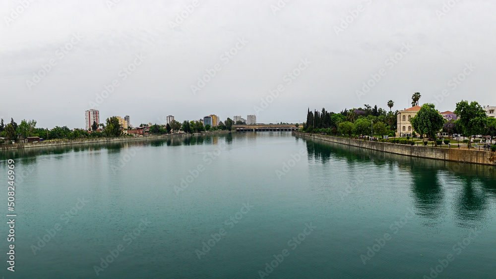 14 May 2022 Adana Turkey. Sabanci mosque and Seyhan river on a cloudy day