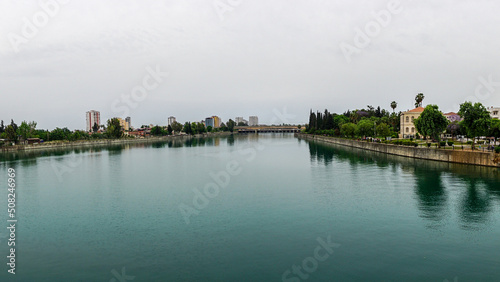 14 May 2022 Adana Turkey. Sabanci mosque and Seyhan river on a cloudy day © Mehmet Doruk Tasci