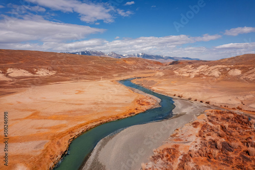 Autumn landscape winding river and mountains Altai Republic Russia, white sand in Moon valley, aerial top view sunny day