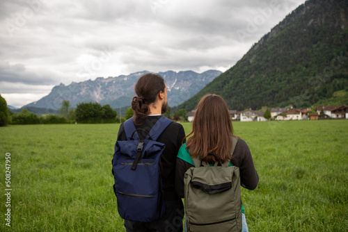 Couples travelling in the green mountains in Austria