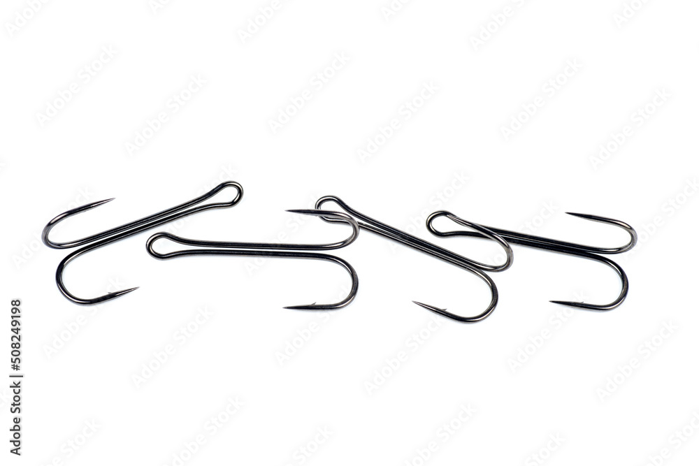 Hooks for professional spinning fishers isolated on white. Hooks for professional spinning fishers isolated on white.