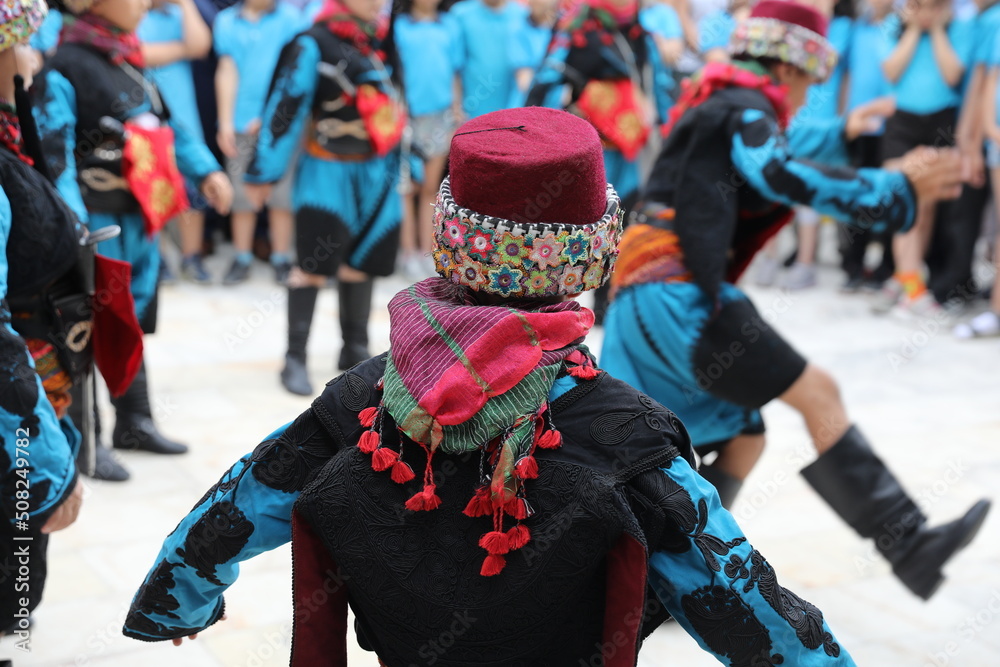 Turkey, Mugla, Mentese local cultural festival folklore (efe zeybek) men's and women's clothes - obrazy, fototapety, plakaty 