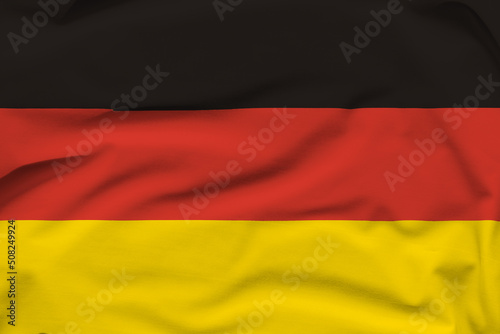 Germany national flag  folds and hard shadows on the canvas