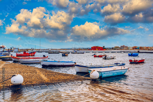 The picturesque village of Marzamemi, in the province of Syracuse, Sicily. Square of Marzamemi, a small fishing village, Siracusa province, Sicily, italy, Europe. photo