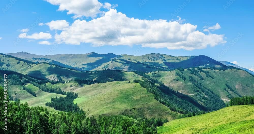 Green grass and mountain natural landscape in Xinjiang, China. Green grass and mountain natural landscape in Xinjiang, China.