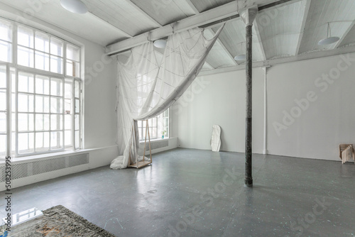 Photo studio interior with hanging parachute. photo