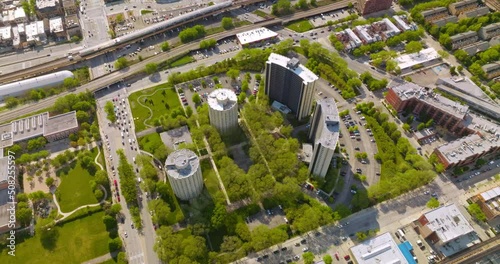 Unusual modern architecture of an amazing Chicago, Illinois. Beautiful buildings in the green trees surrounded by busy roads. photo