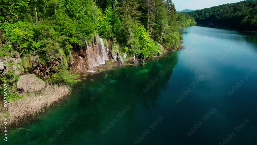 Waterfall in Plitvice National Park, Green forest and Blue Lake in Croatia, Colorful Spring Waterfall in Plitvice National Park, Green forest and Blue Lake in Croatia, Colorful Spring