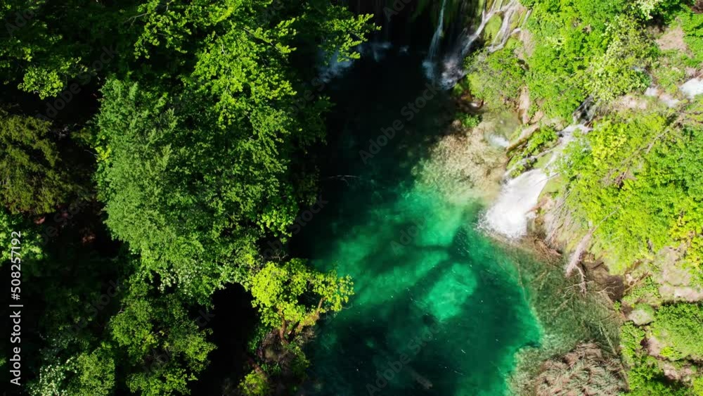 Aerial Of Lush Green Forests At Plitvice Lakes With Pedestal Down To Reveal Cascading Waterfalls Drone Aerial Of Lush Green Forests At Plitvice Lakes With Pedestal Down To Reveal Cascading Waterfalls Drone