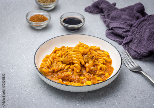 Red sauce pasta slow-cooked in tomato sauce, prepared with flavourful spices