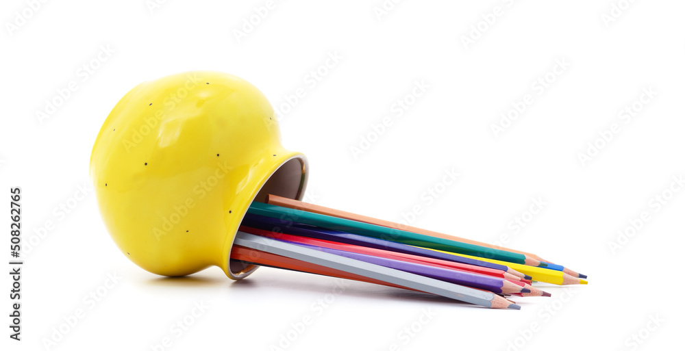 Many colorful pencils in weight. Many colorful pencils in weight.