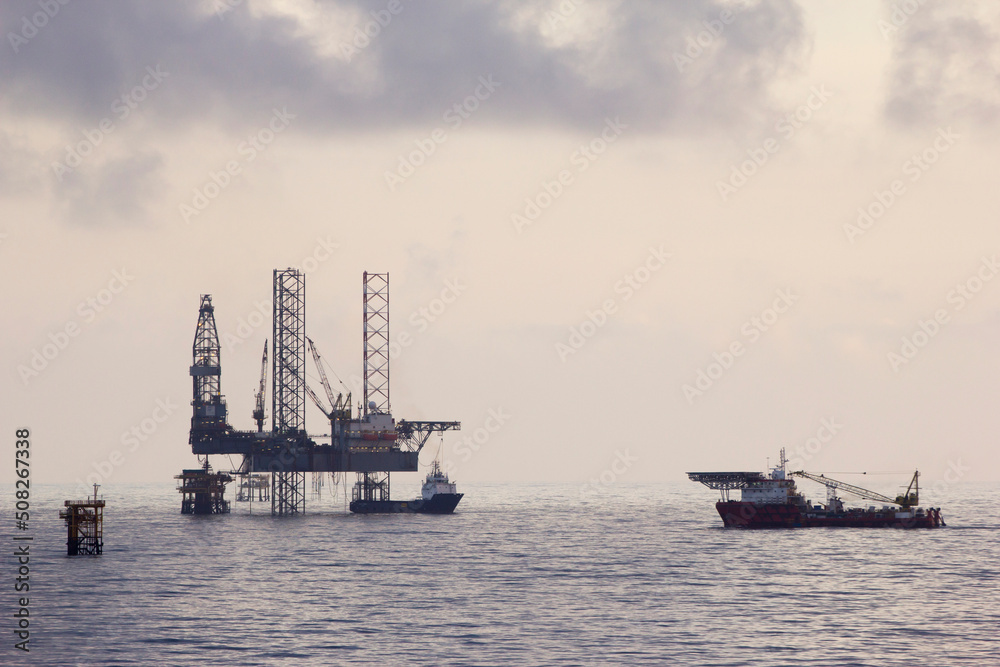 Oil rigs and supply boat
