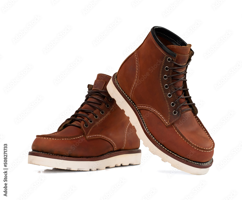 Men fashion brown boots leather isolated on white background. clipping path Men fashion brown boots leather isolated on white background. clipping path