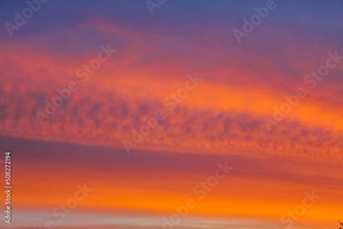 Amazing colorful pink violet blue and purple sunset sky panorama.