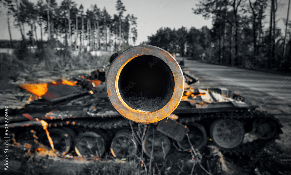 Close up of the barrel of a destroyed Russian tank during the military invasion of Ukraine. Ukraine war.