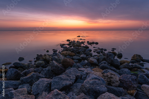 Morning light Odessa city beach with rocks background 