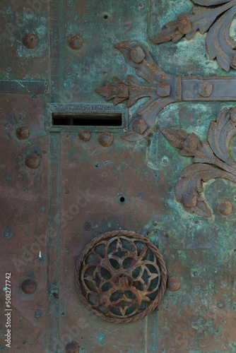 ancient metal door with ornaments