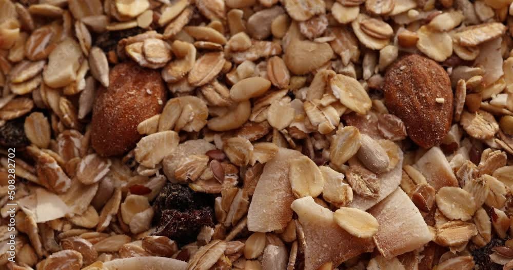 Mix nuts, raisins and oatmeal, macro, zero waste concept. Mix nuts, raisins and oatmeal, macro, zero waste concept.