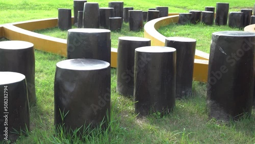 Wooden pillars in the park. Equipment for children.